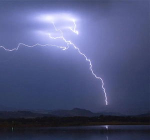 What is an electric arc? What are the hazards of electric arc and what are the common methods of arc extinguishing
